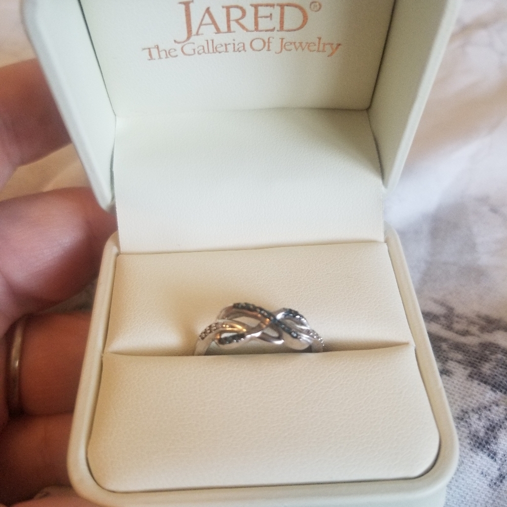 Beautiful blue and white diamond Infinty ring.